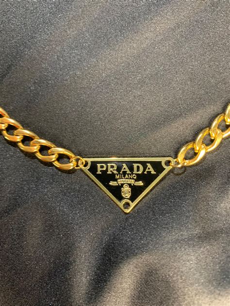 prada gold necklace